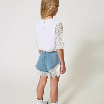 Blusa in pizzo e sangallo