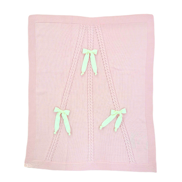 Copertina rosa in lana con trecce e fiocchetto "Le Dodò"