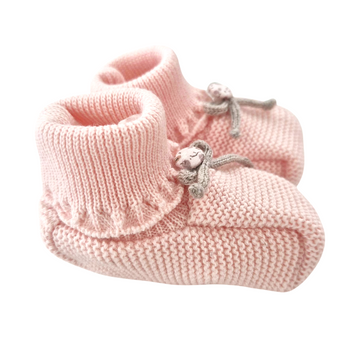 Scarpina in lana neonata con fiocchetto e bottone