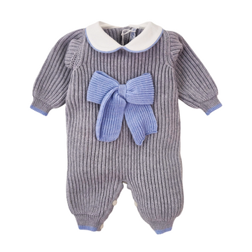 Tutina neonato in lana con fiocco a coste