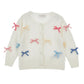 Cardigan Bimba con fiocchi
