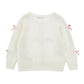 Cardigan Bimba con fiocchi