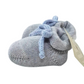 Scarpina neonato in lana con fiocco celeste