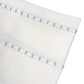 Copertina con trecce ricamate in celeste