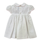 Vestina in cotone con ricamo punto smock