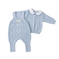 Set nascita con trecce ondulate