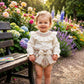 Completo Bimba con collo camicia punto smock